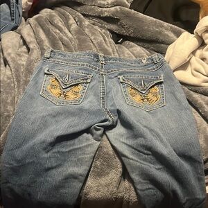 Stylish Blue Jeans with Embroidered Pockets